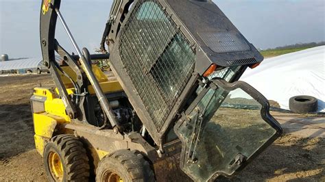 how to tilt cab on case skid steer|new holland skid steer cab tilting.